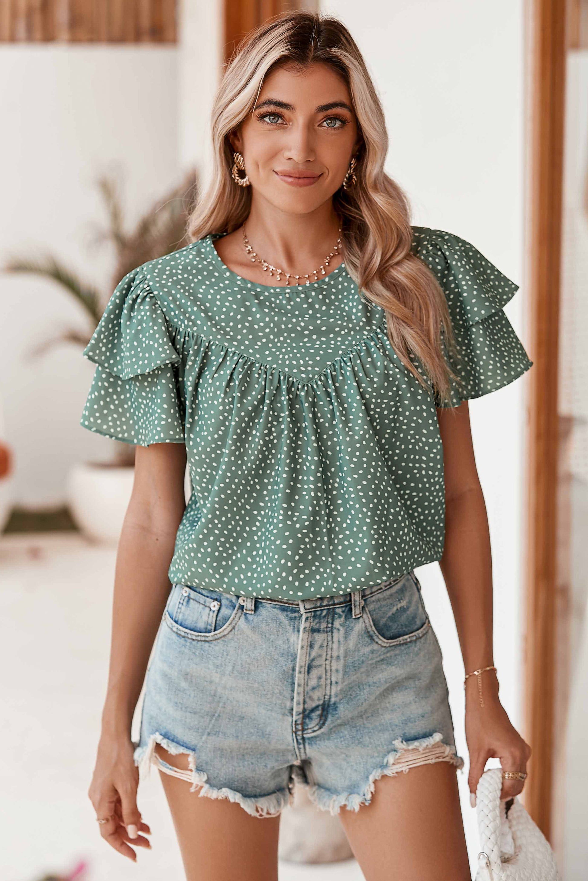 Laurel Green Spotted Print Pleated Ruffle Sleeve BlouseMaterial:100%Polyester



		The spotted print is a timeless and versatile choice that can easily be dressed up or down.
	
	
		The loose fit allows for a relaxed