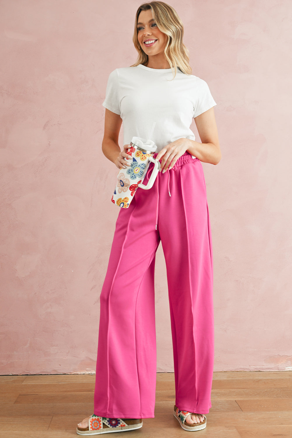 Rose Red Drawstring Smocked Waist Wide Leg PantsMaterial:50%Polyester+45%Viscose+5%Elastane



		The high waist and wide leg designs ensure wearers feel slim and fashionable.
	
	
		Featuring an elastic smocke