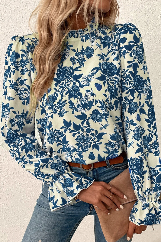 Sky Blue Floral Print Flounce Sleeve Keyhole Back BlouseMaterial:100%Polyester

• Embrace a bohemian vibe with our blouse, featuring intricate floral patterns that exude a free-spirited charm.
• The flounce sleeves add 