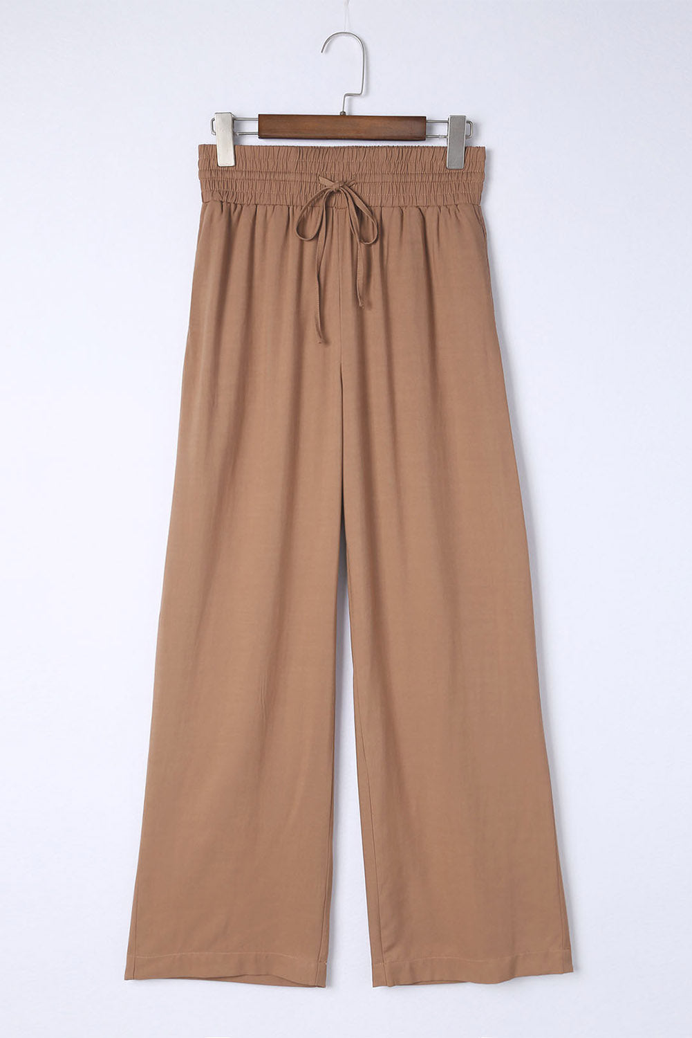 Blue Casual Drawstring Shirred Elastic Waist Wide Leg PantsMaterial:65%Viscose+35%Polyester



		These wide leg pants
are casual and comfy with a loose fit style
	
	
		The smocked waist
design is fashionable and very 