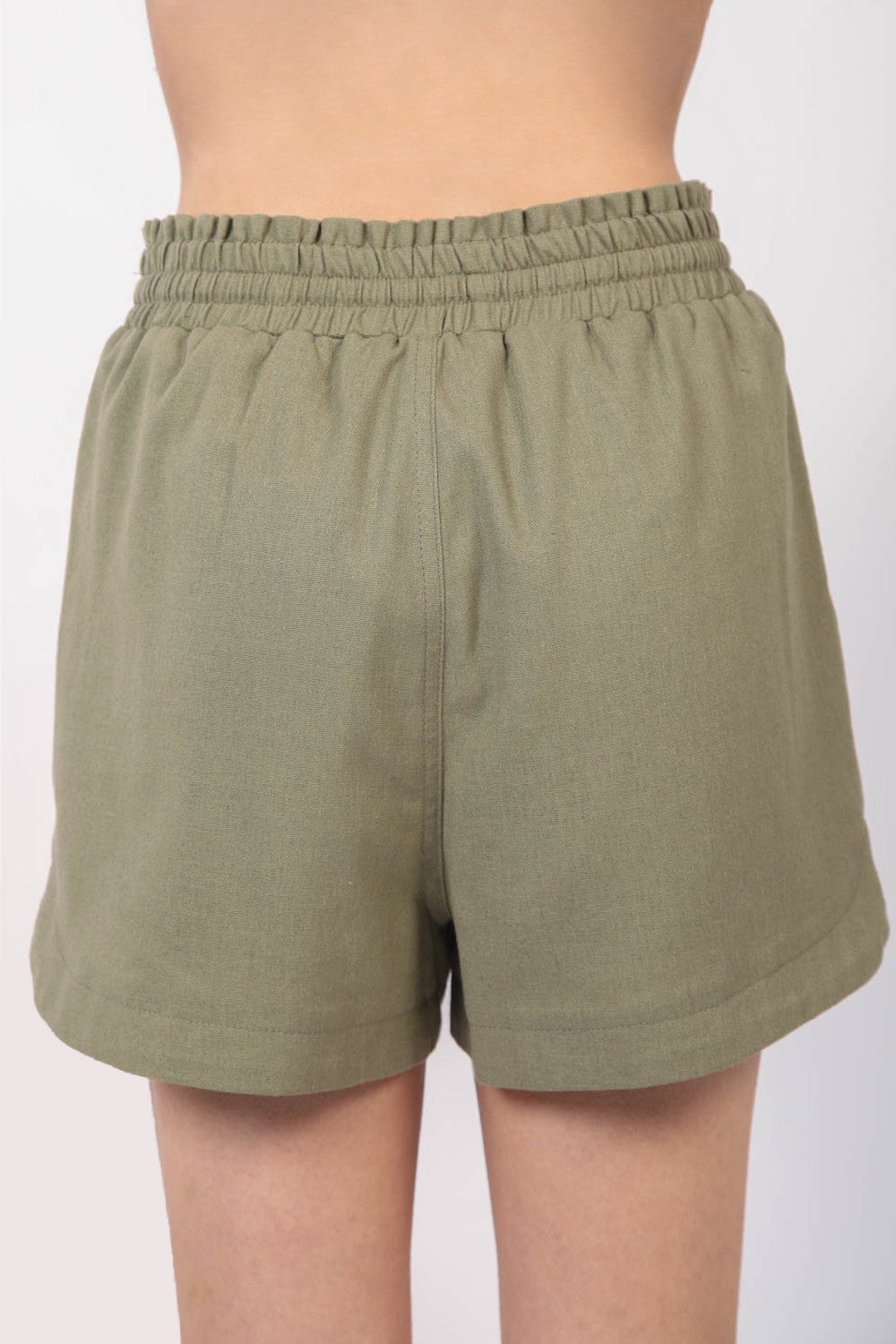 VERY J Drawstring Elastic Waist Linen ShortsStay cool and comfortable in these Elastic Waist Solid Linen Shorts featuring side pockets and a round hem for added style. These Cool Comfort Eco-Friendly Recycling