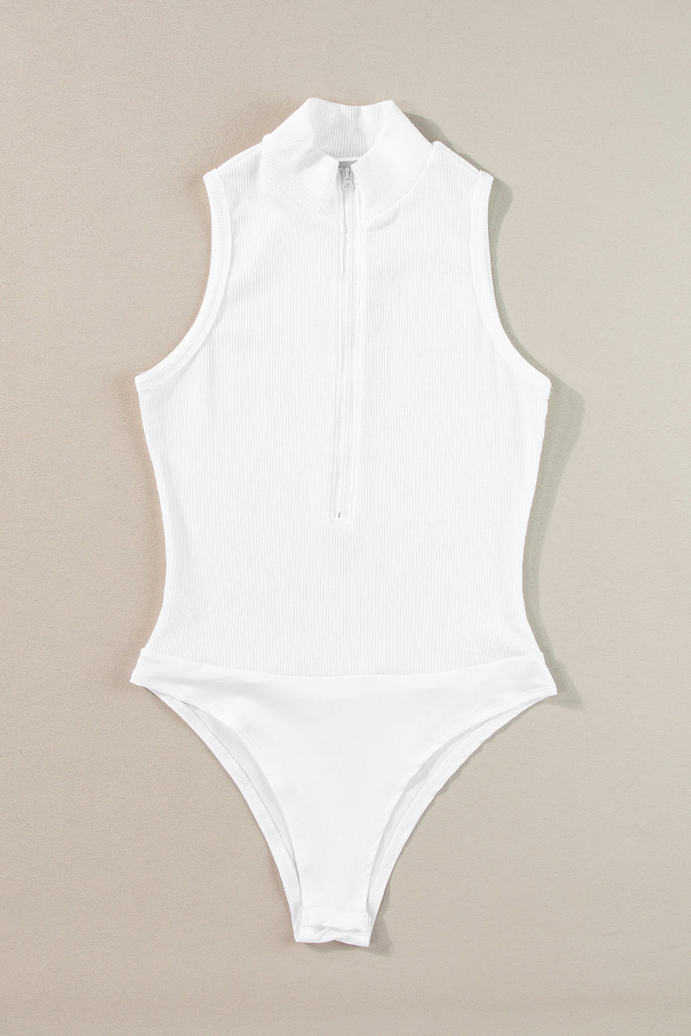 White Zip Up Mock Neck Ribbed Sleeveless BodysuitMaterial:95%Polyester+5%Elastane



		The zip-up feature of this chic bodysuit provides convenient on and off access. 
	
	
		Adding a touch of sophistication an