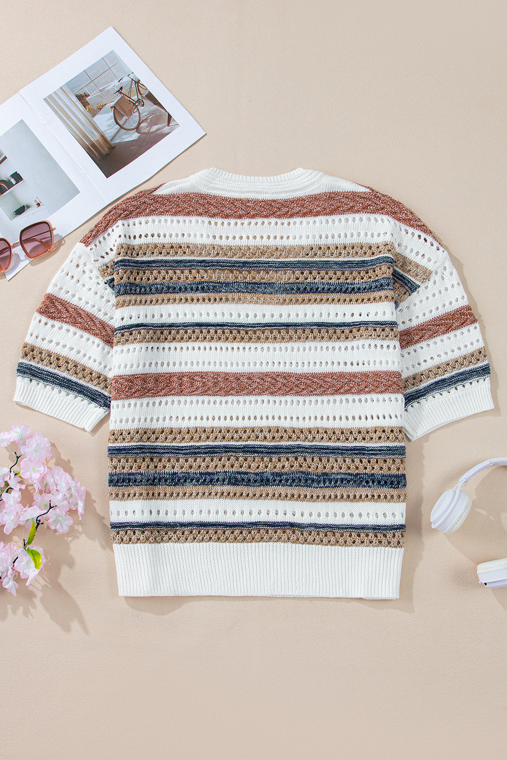 Multicolour Striped V Neck Hollow Knitted Half Sleeve SweaterMaterial:100%Polyester

• The rib-knit design offers a cozy fit suitable for any casual occasion.
• Stay stylish and comfortable in this trendy piece featuring hol