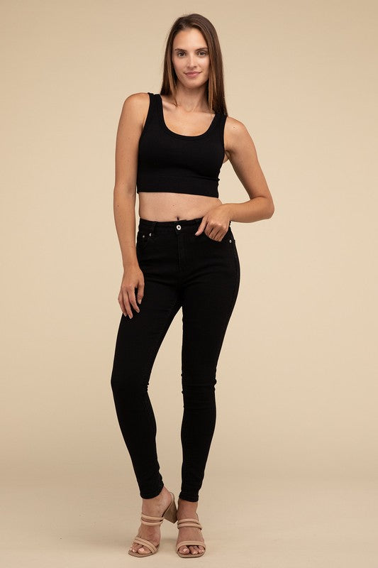 Ribbed Seamless Crop TopElevate your summer essentials with our Ribbed Seamless Crop Top, a versatile piece perfect for layering or wearing solo. Crafted with comfort in mind, it boasts a f