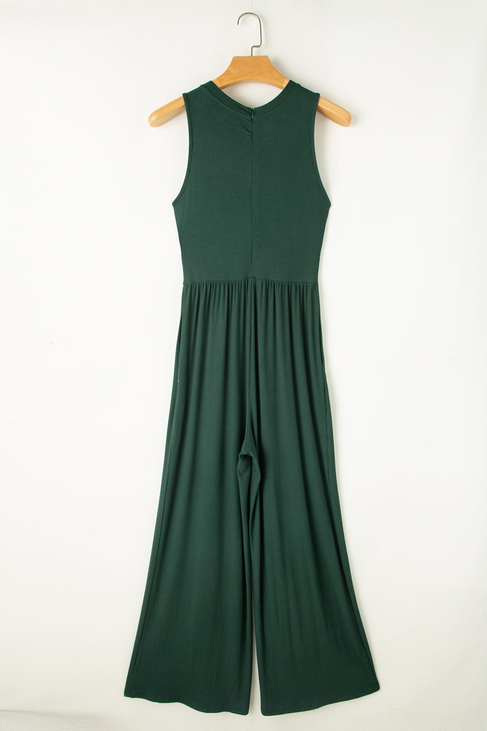 Blackish Green Sleeveless High Waist Wide Leg JumpsuitMaterial:93%Viscose+7%Elastane



		The jumpsuit features a sleeveless design, meaning it does not have sleeves and exposes the arms. 
	
	
		The jumpsuit has a 