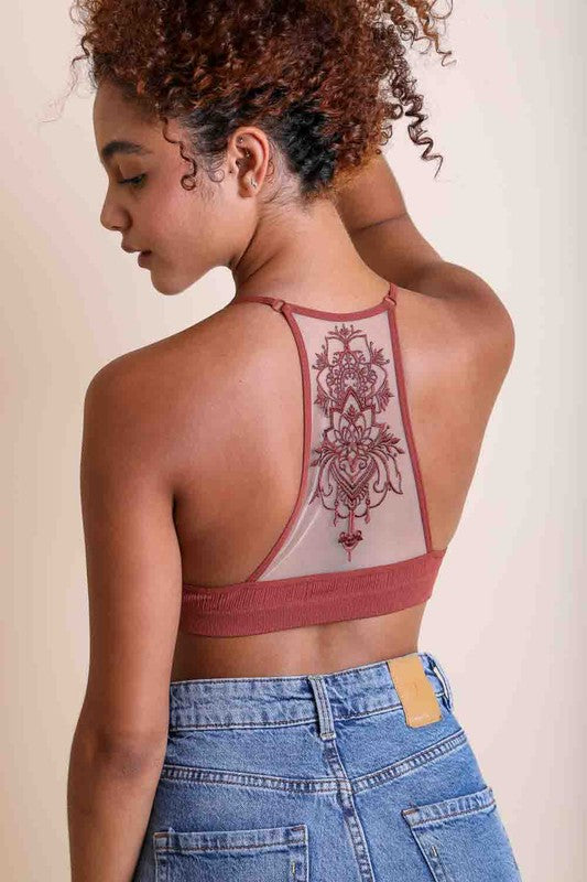 Tattoo Mesh Racerback BraletteTattoo Mesh Racerback BraletteNo Adjustable StrapHeat Stamped Care LabelImmediate ShippingCup Fit XS/S: 32A 32B 32C 34A 34BM/L: 32D 34C 36B 36C 38BModel Measurements