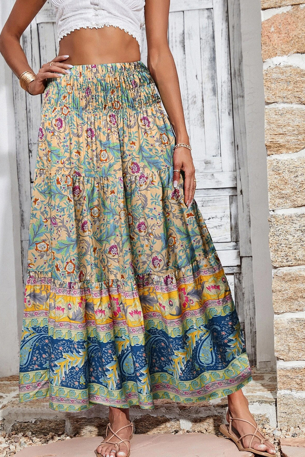 Sky Blue Boho Floral & Paisley Print Shirred Waist Long SkirtMaterial:100%Viscose

• Embrace a bohemian flair with this skirt, featuring a shirred waist that accentuates the natural curves for a flattering fit.
• The intrica