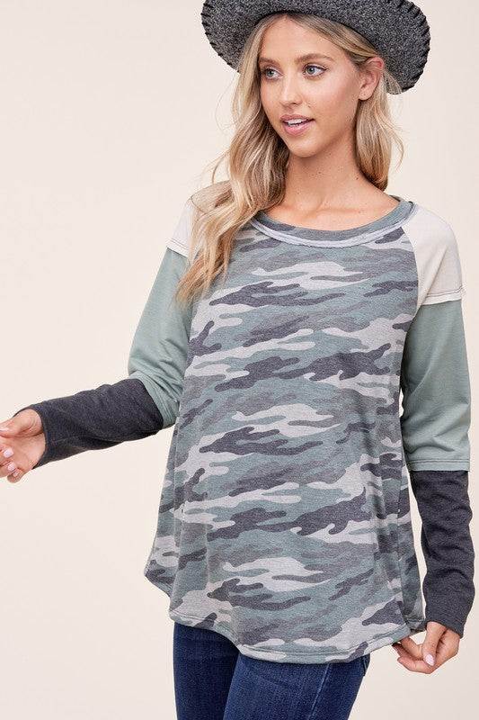 CAMOUFLAGE COLOR BLOCK TOPFRENCH TERRY CAMOUFLAGE PRINT AND SOLID COLOR BLOCKED LONG SLEEVE ROUND NECK RAW EDGE DETAIL TOP - MADE IN U.S.A.
Style: Casual
Print / Pattern: CAMOUFLAGE PRINT &am