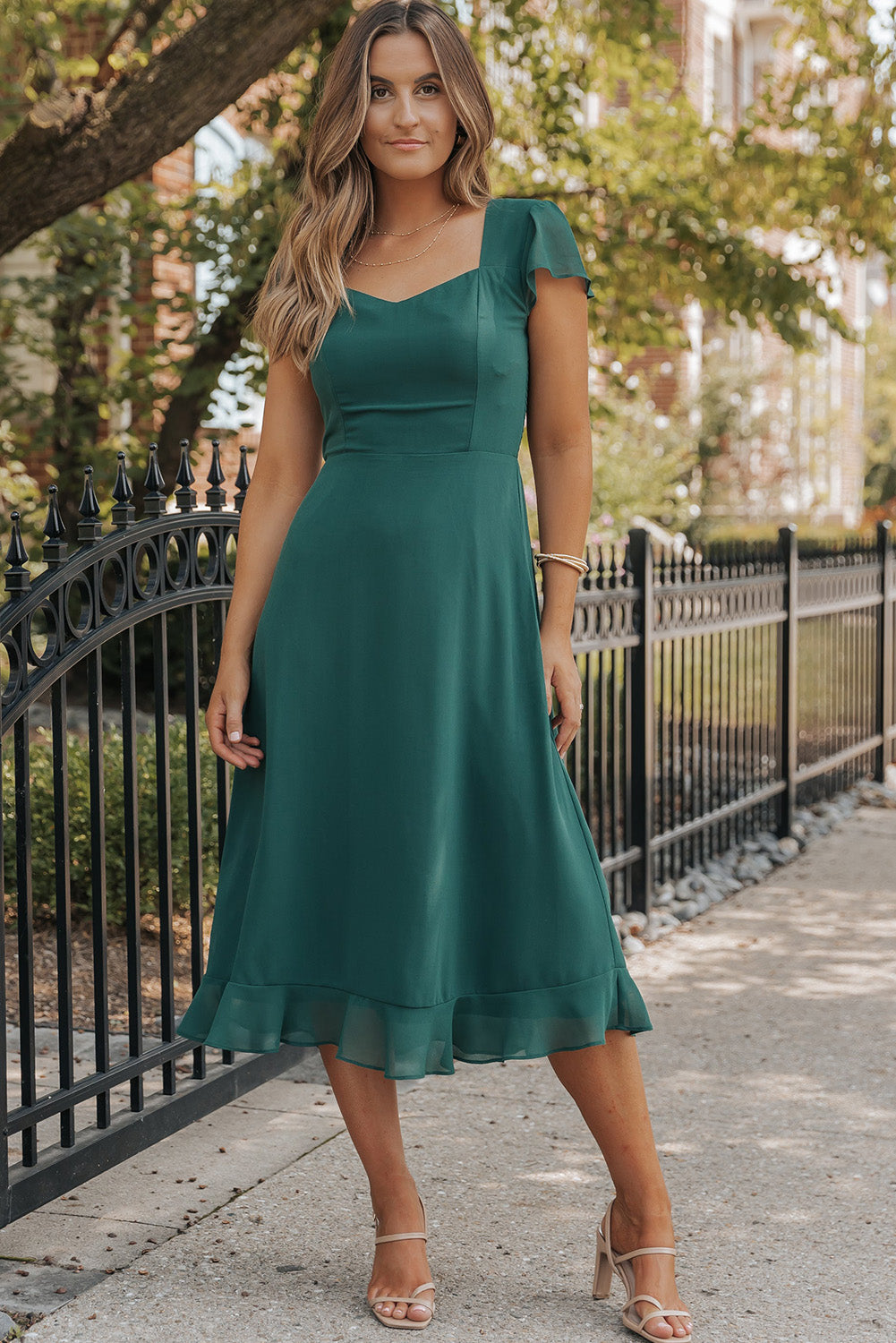 Sea Green Shirred Open Back Sweetheart Neck Ruffled Midi DressMaterial:100%Polyester



		This elegant dress gives a fit flare silhouette
	
	
		The sweetheart neck, flutter sleeve and ruffled hem are designed to graceful
