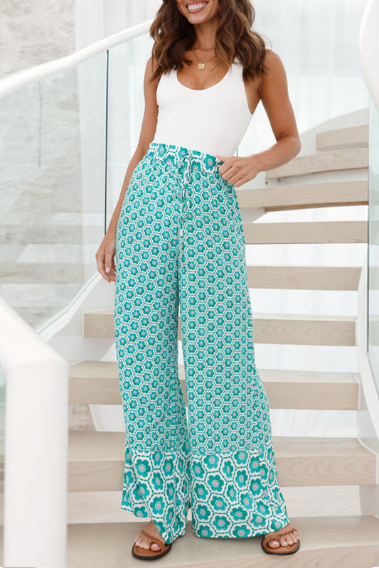 Green Boho Geometric Print Drawstring High Waist Flared PantsMaterial:100%Polyester

• Elevate your daily style with these pants, featuring a high waist design for a flattering silhouette.
• The intricate geometric print add