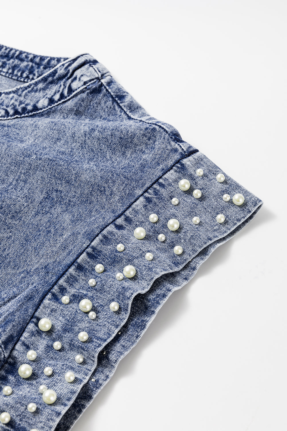 Dusk Blue Acid Wash Pearl Embellishment O Neck Denim TopMaterial:100%Cotton



		The top features a trendy acid wash design with pearl embellishments, adding a touch of sophistication to your outfit.
	
	
		This denim