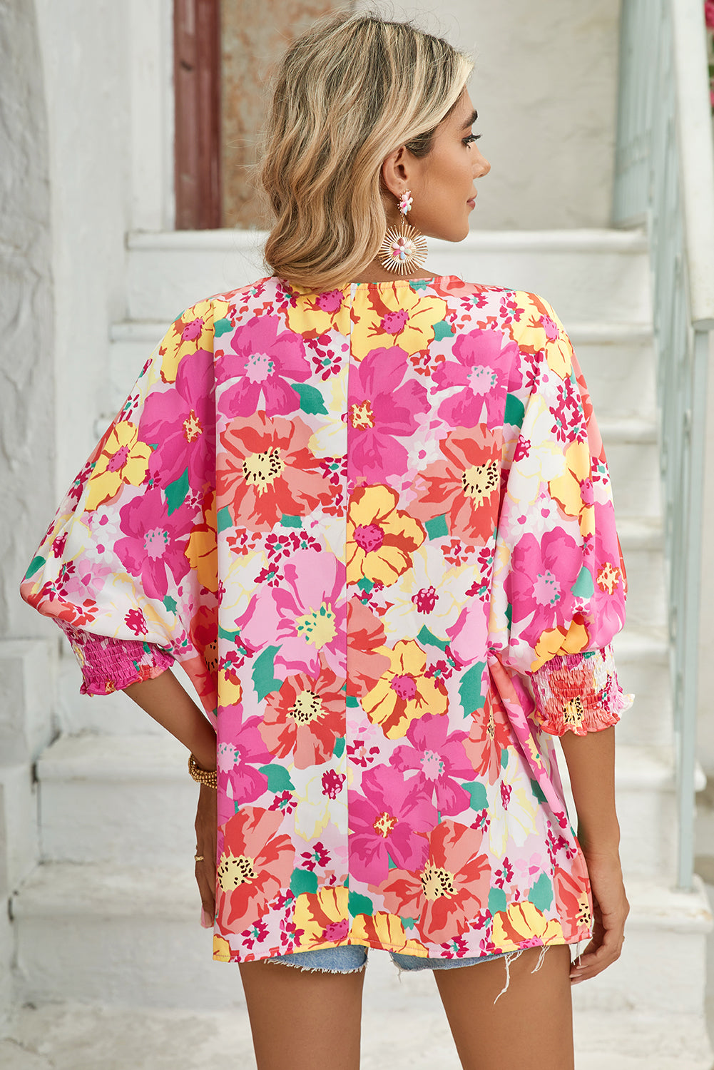 Pink Shirred Cuffs 3/4 Sleeve Boho Floral BlouseMaterial:100%Polyester



		The blouse is a stylish and feminine top featuring shirred cuffs and a boho-inspired floral print, adding a touch of bohemian charm to 