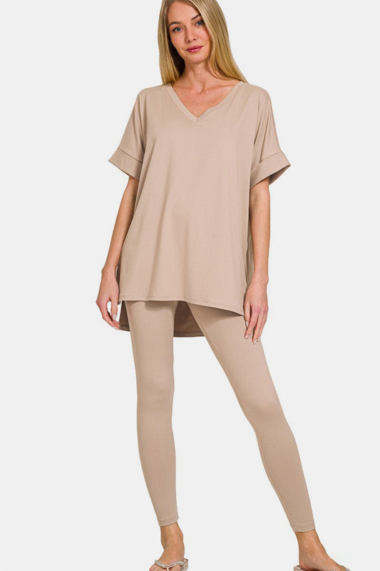 Zenana Full Size V-Neck Rolled Short Sleeve T-Shirt and Leggings LoungThe V-neck rolled short sleeve t-shirt and leggings lounge set offers the perfect blend of comfort and style for a laid-back day. The V-neck design adds a touch of s