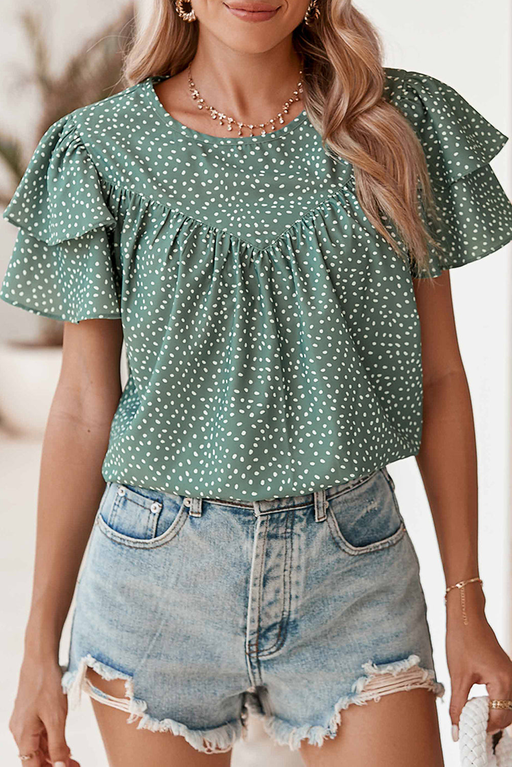 Laurel Green Spotted Print Pleated Ruffle Sleeve BlouseMaterial:100%Polyester



		The spotted print is a timeless and versatile choice that can easily be dressed up or down.
	
	
		The loose fit allows for a relaxed