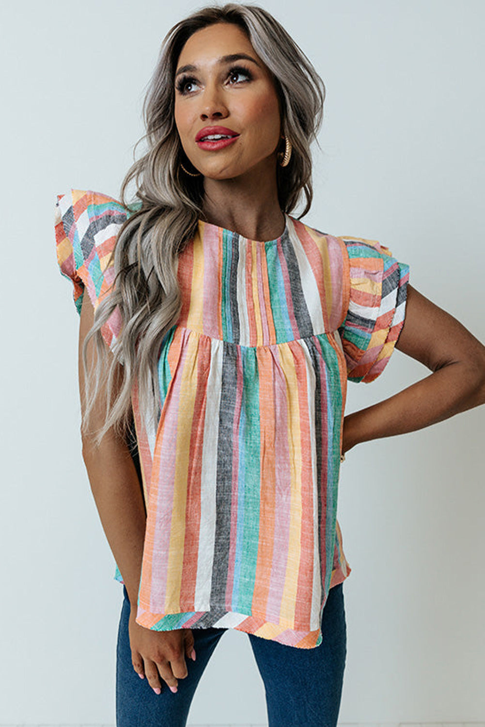 Multicolor Striped Back Button Keyhole Layered Sleeve BlouseMaterial:100%Polyester



		Vibrant and eye-catching striped print design.
	
	
		Tiered sleeves add a unique and stylish touch to the blouse.
	
	
		Pair with