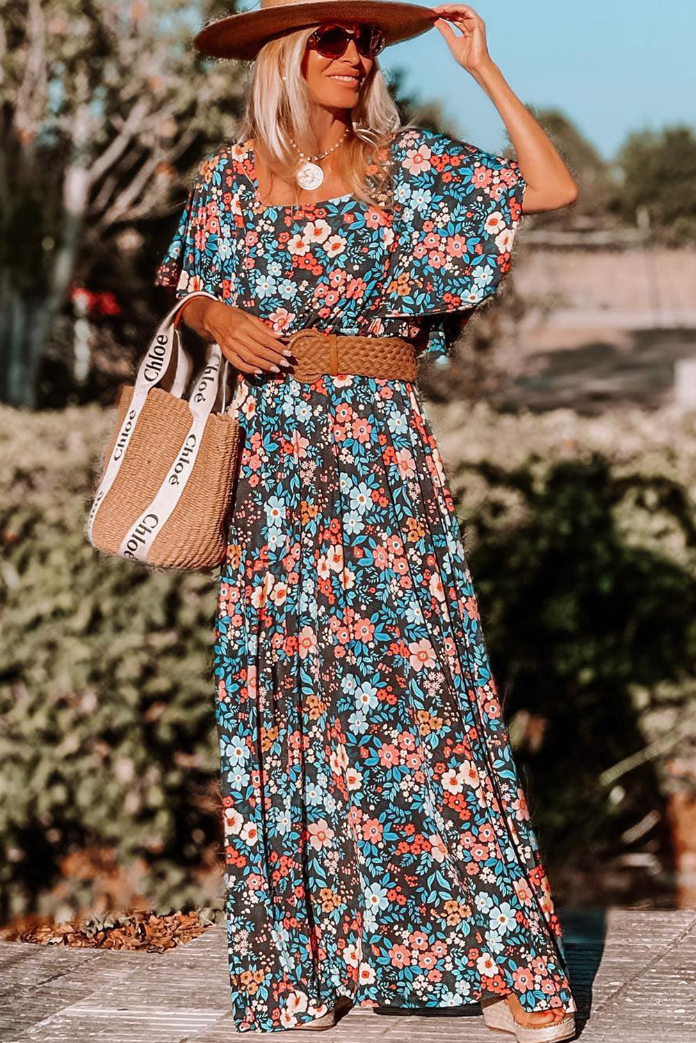 Sky Blue Boho Floral Print Knotted Backless Maxi DressMaterial:100%Viscose



		This is a perfect dress for summer fashion
	
	
		Features a elegant silhouette with flowy sleeves
	
	
		Only the relaxed long dress