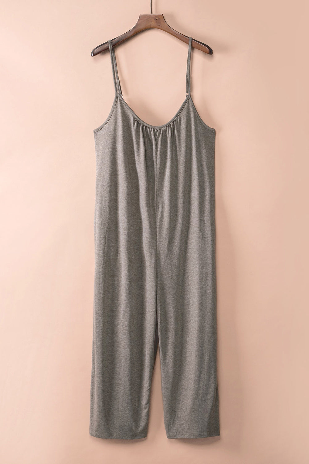 Grey Casual Spaghetti Straps Wide Leg Pocketed JumpsuitsMaterial:Knit


	


		Sleeveless spaghetti straps allow you to expose a large area of skin, making you cooler in summer
	
	
		The wide-leg version is very sty