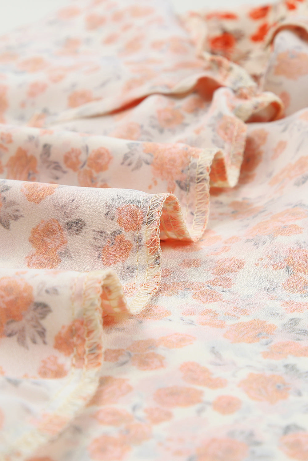 Orange Floral Tiered Flutter Sleeve BlouseMaterial:100%Polyester



		Featuring flowy flutter sleeves that add a touch of femininity to any outfit.
	
	
		Elevate your wardrobe with this stunning tiered 