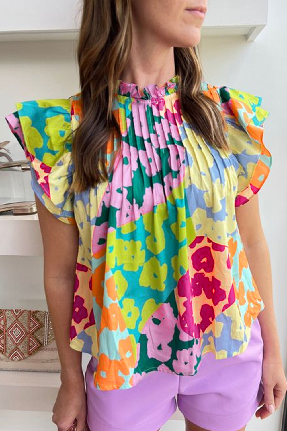 Multicolor Abstract Print Layered Ruffle Sleeve Pleated BlouseMaterial:100%Polyester



		The blouse is a vibrant and stylish blouse featuring an abstract print, perfect for adding a pop of color to your outfit.
	
	
		Made