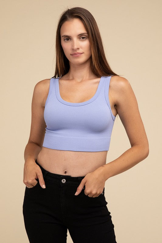 Ribbed Seamless Crop TopElevate your summer essentials with our Ribbed Seamless Crop Top, a versatile piece perfect for layering or wearing solo. Crafted with comfort in mind, it boasts a f