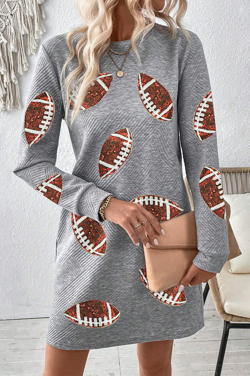 Gray Sequin Rugby Graphic Round Neck Textured Mini DressMaterial:97%Polyester+3%Elastane

• Shimmer and shine in the dress, perfect for adding a touch of glamour to your wardrobe. 
• With its long sleeves and round neck