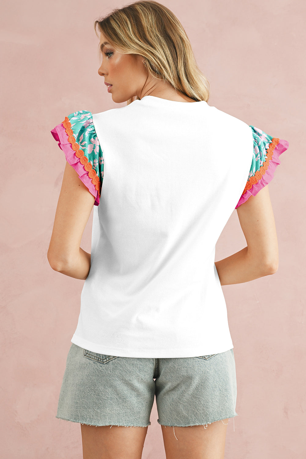 White Color Block Floral Print Ruffle Sleeve BlouseMaterial:70%Polyester+25%Cotton+5%Elastane

• Stand out in style with this blouse, featuring delicate floral appliques and charming ruffle details.
• Embrace a cas