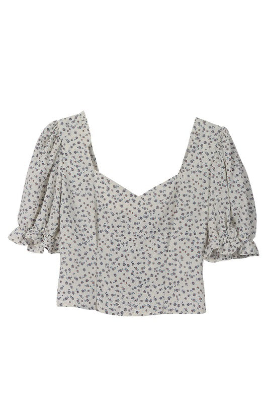 SS puff sleeve top*Flirty neckline with puff sleeve top *Pattern type : floral print*Neck line : sweetheart neck*Sleeve type : puff sleeves*Sleeve length : short sleeves*Stretch : no 