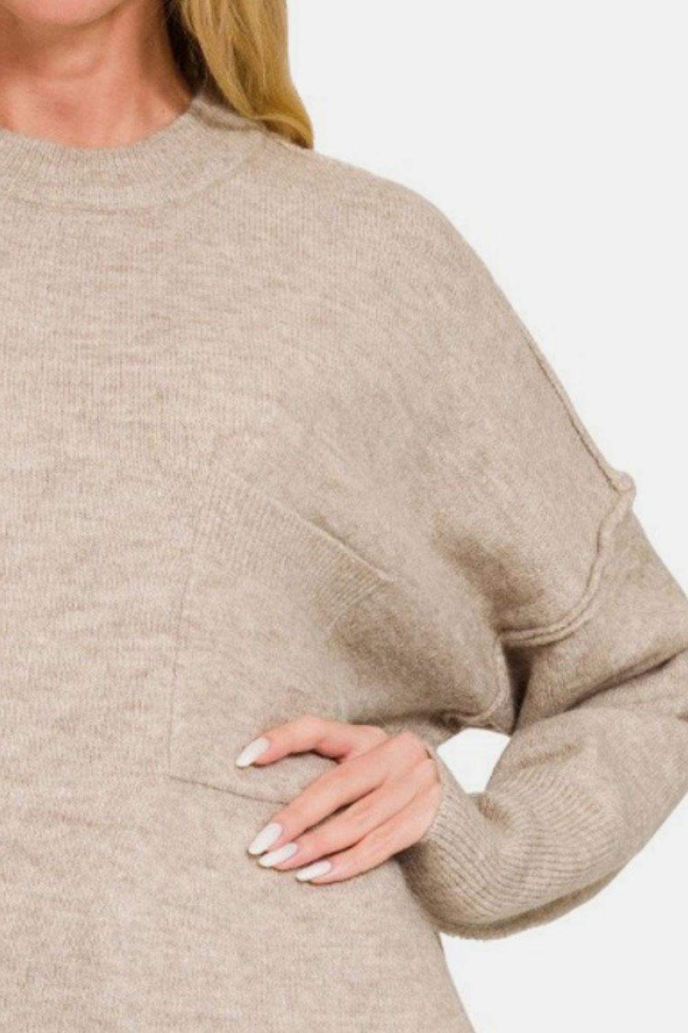 Zenana High-Low Hem Drop Shoulder SweaterThis hi-low hem pocket sweater is crafted from soft and midweight material, making it both cozy and comfortable for everyday wear. The hi-low hem adds a trendy touch