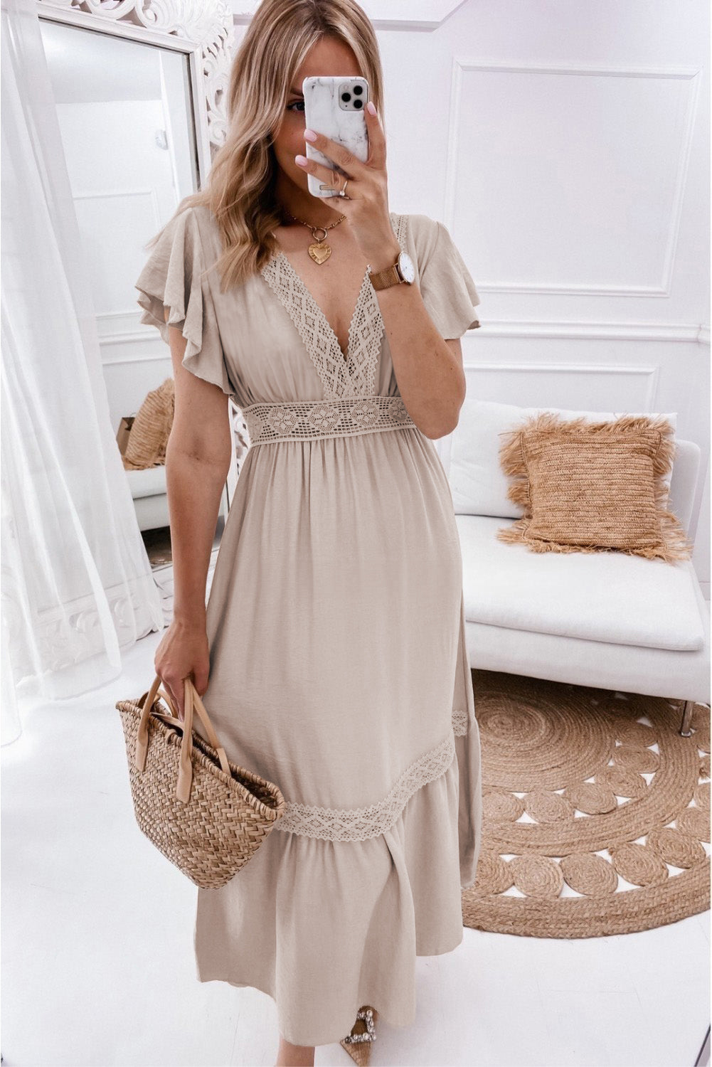 Oatmeal Lace V Neck Ruffled Sleeve Empire Waist DressMaterial:100%Polyester



		Delicate lace splicing details adorn the elegant dress, adding a romantic and feminine touch
	
	
		The high waist design of this dre