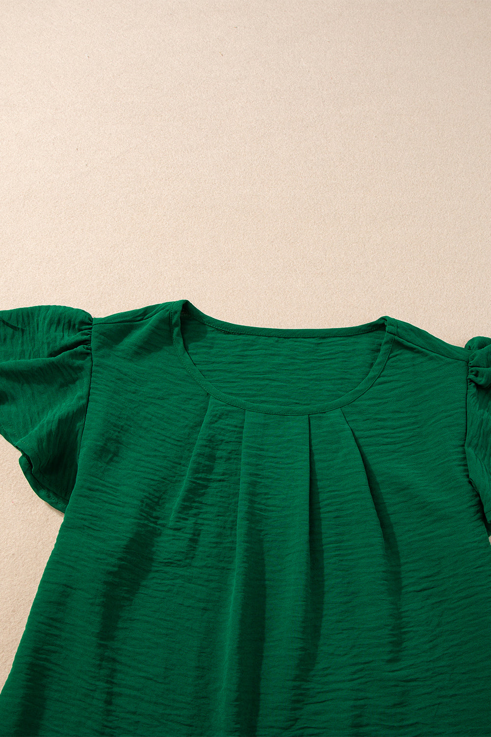 Dark Green Plain Textured Pleated Ruffle Sleeve BlouseMaterial:100%Polyester



		This blouse is crafted with a crinkle texture, providing a unique and fashionable element to elevate your look. 
	
	
		The solid col