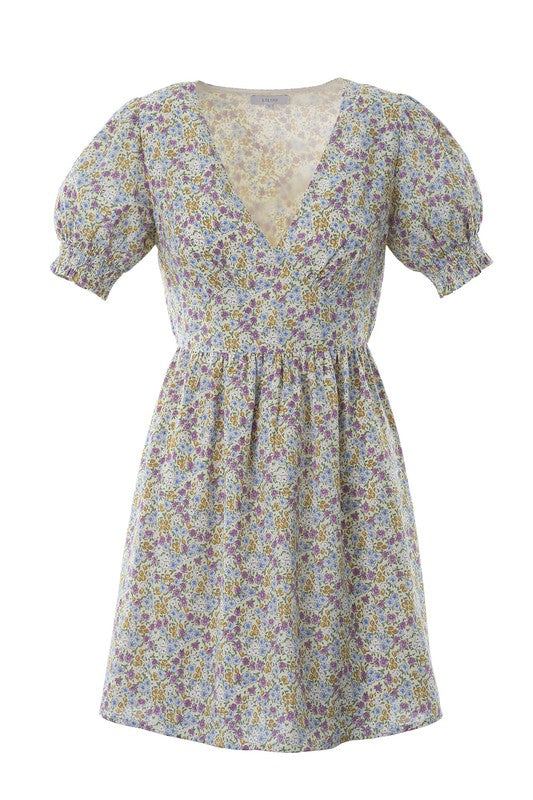 Floral V neck dress- Floral V neck dress- Pattern type : floral print - Neck line : V neck- Sleeve type : puff sleeves- Sleeve length : short sleeves- Stretch : no stretch- Sheer : lin