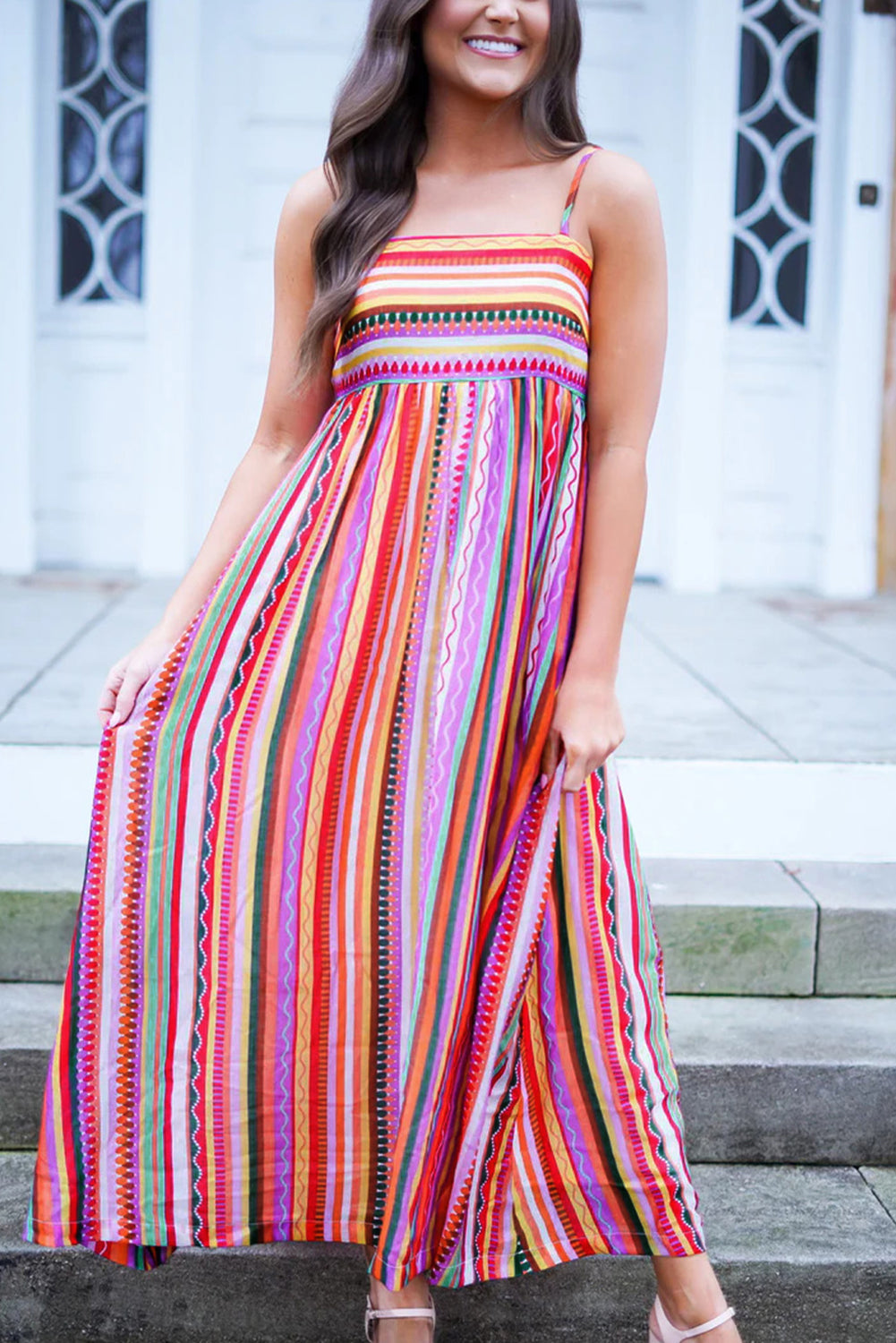 Multicolour Boho Striped Spaghetti Strap Smocked Back Maxi DressMaterial:100%Polyester

• Embrace a vibrant blend of colors in this maxi dress, perfect for daily wear with its relaxed, sleeveless design.
• The shirred back ensu