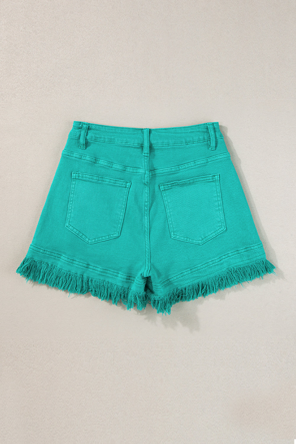 Turquoise Raw Hem Mid Rise Denim ShortsMaterial:98%Cotton+2%Elastane



		Discover a level of style that surpasses expectations with these denim shorts, offering a chic and fashionable look that goes be