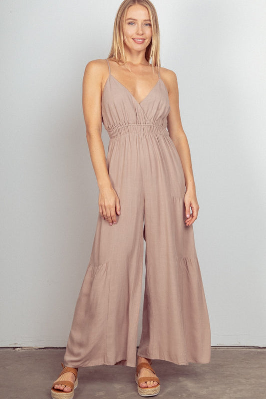 VERY J Sleeveless Ruched Wide Leg JumpsuitThe Woven Wide Leg Jumpsuit is a stylish and versatile outfit option. This sleeveless jumpsuit features adjustable straps for a customizable fit. The elastic waist a