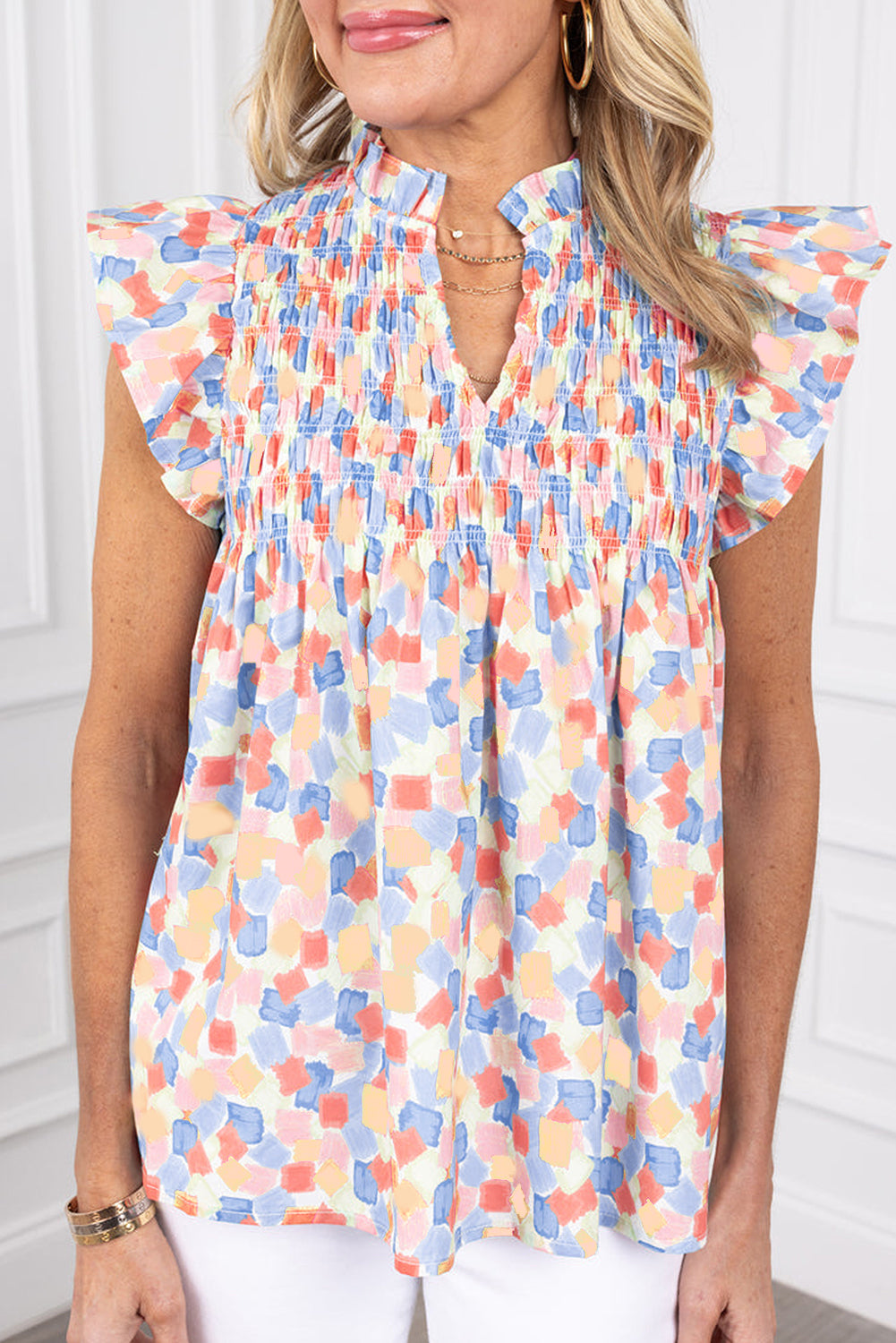 Pink Shirred Yoke Ruffle Abstract BlouseMaterial:100%Polyester

• Embrace a bohemian vibe with this blouse, featuring a delicate shirred yoke that adds a touch of elegance to the design.
• The abstract p