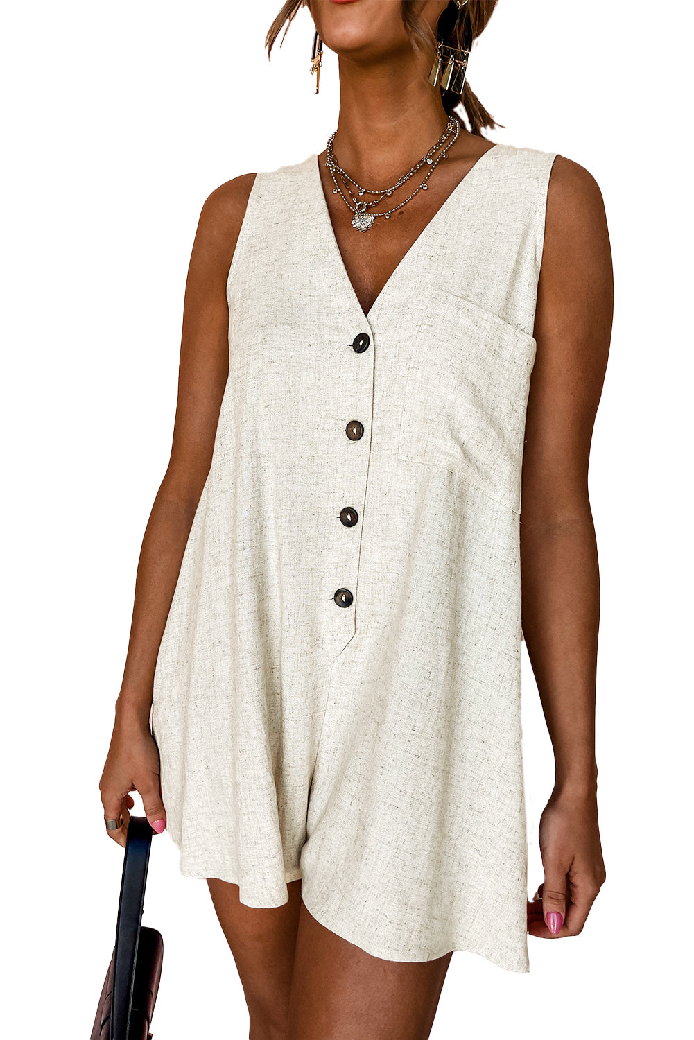 Beige V Neck Buttoned Front Chest Pocket Sleeveless RomperMaterial:92%Viscose+8%Linen

• Effortlessly chic, this romper exudes casual sophistication with its plain design and convenient chest pocket, perfect for a day out 