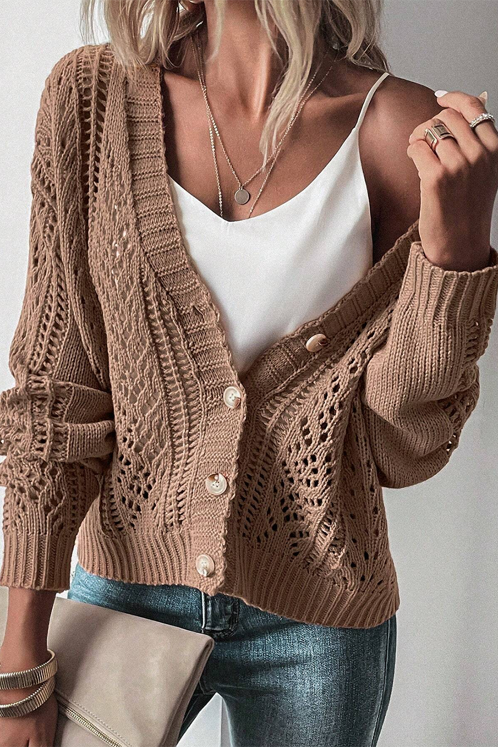 Real Teal Hollow Knit Drop Shoulder CardiganMaterial:60%Cotton+40%Acrylic

• Elevate your casual wardrobe with the cardigan, crafted for comfort and style, ideal for layering during transitional seasons.
• T