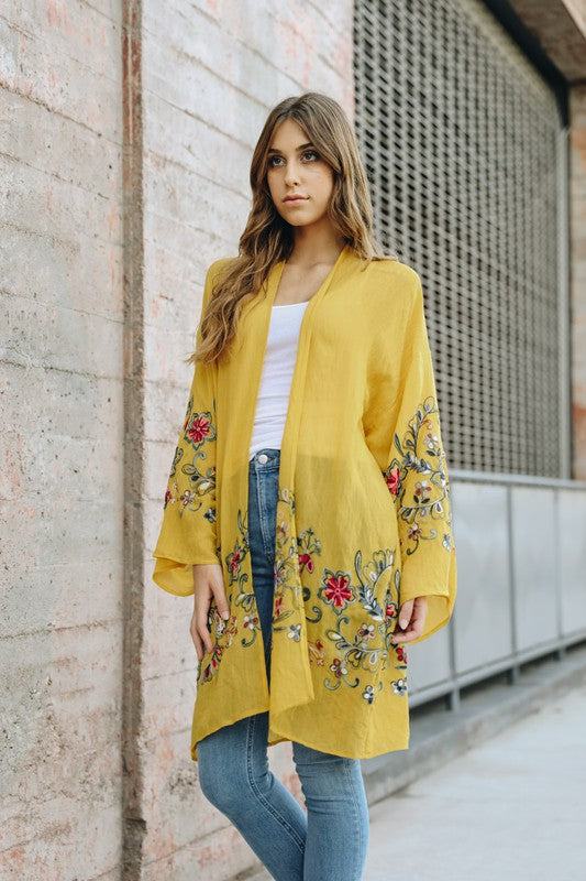 Long Floral Kimono CardiganLong Floral Kimono CardiganImmediate ShippingOne Size Fits MostSizes 0-12Length: 38 inBust Across: 25 inSleeve Length: 17 inSleeve Opening: 11 in
Style: Kimono
Print