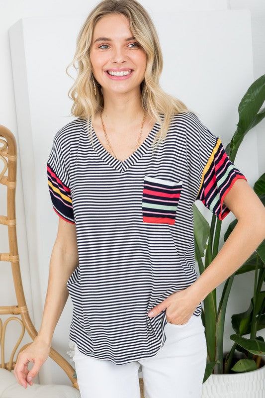 MULTI STRIPE BOXY TOP- Multi stripe boxy top- Pullover short sleeves- V neck chest pocket- Multi stripe jersey - Model is 5' 8" 34-24-34 and wearing a Small- S/M/L 2-2-2- 95% RAYON, 5% S