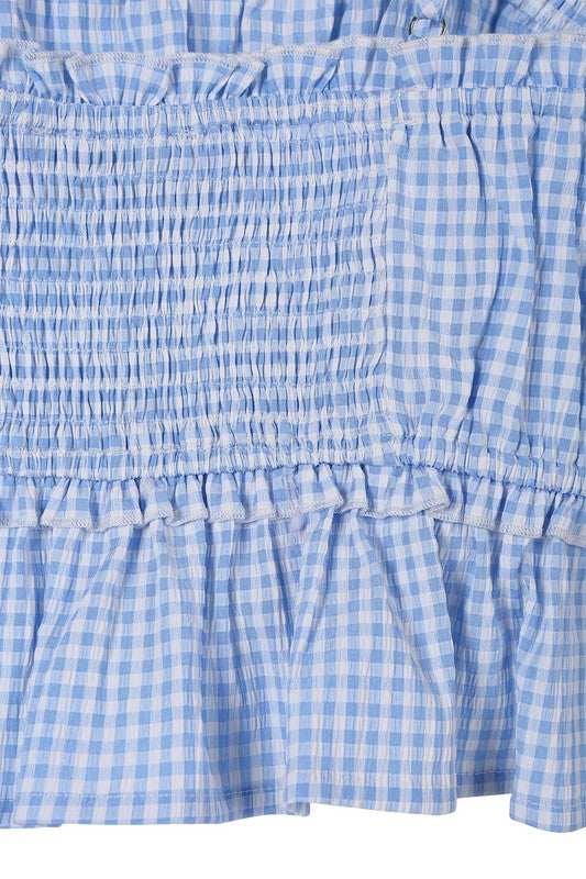 Blue gingham tank top*Blue gingham tank top*Pattern type : gingham *Sleeve length : sleeveless*Stretch : no stretch*Sheer : not lined, but not sheer*Care instruction : machine wash cold,