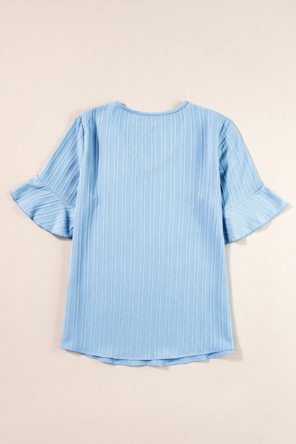 Beau Blue Ruffled Short Sleeve V Neck Textured BlouseMaterial:97%Polyester+3%Elastane



		Elevate your style with this stylish and popular women's top featuring textured fabric. 
	
	
		The V-neck, ruffled sleeves