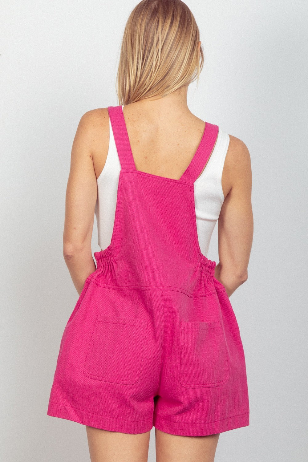 VERY J Adjustable Suspender Overalls with PocketsThe versatile Suspender Solid Woven Casual Overall Romper features front and side pockets for added functionality. The elastic waist ensures a comfortable and adjust