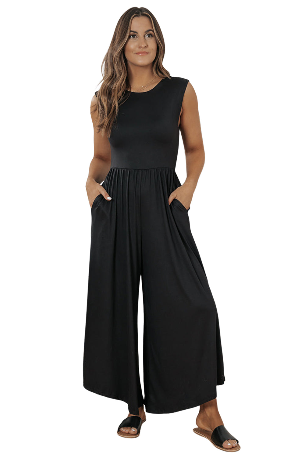 Black Solid Color Open Back Sleeveless Wide Leg JumpsuitMaterial:65%Polyester+30%Viscose+5%Elastane

• Effortlessly chic and versatile, this black jumpsuit features a high waist design for a flattering silhouette.
• The