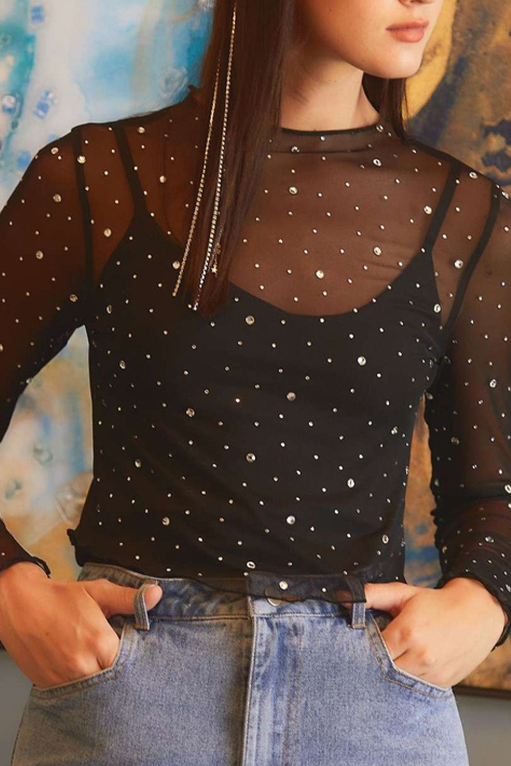 Black Rhinestone Mesh Mock Neck TopMaterial:95%Polyester+5%Elastane



		The top is adorned with rhinestone embellishments. The rhinestones are typically strategically placed to create a dazzling ef