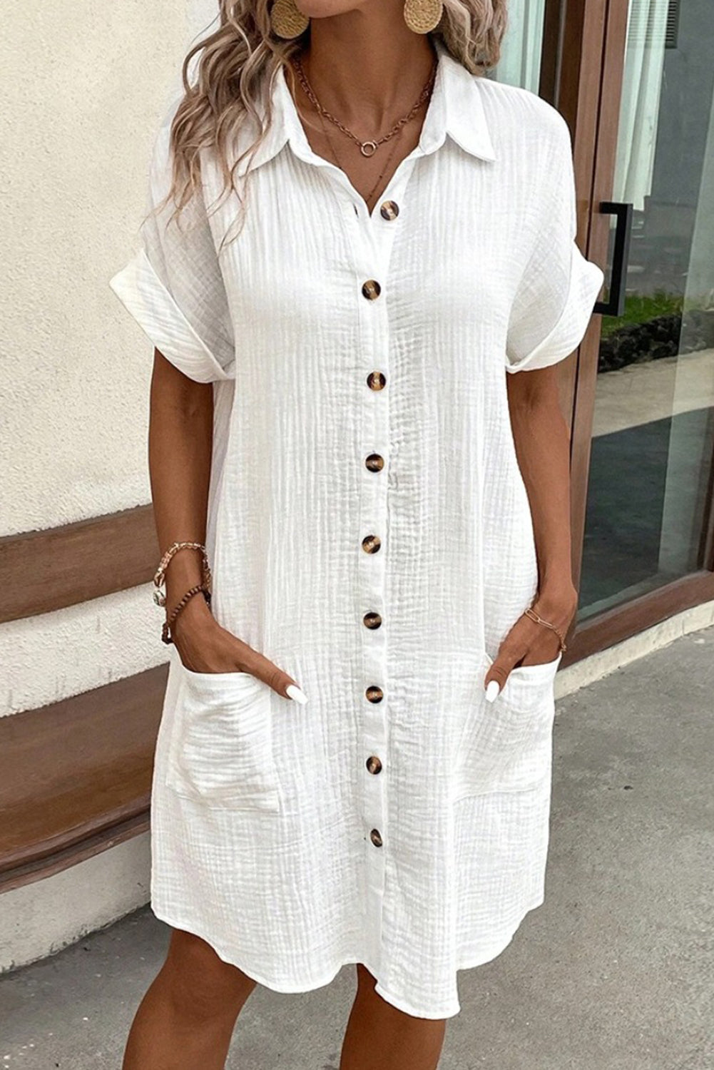 White Solid Color Button Front Roll Up Sleeve Shirt Midi Dress• Crisp and elegant white midi dress with a versatile button front design.
• Features a classic shirt collar and convenient roll-up sleeves for a customizable look.