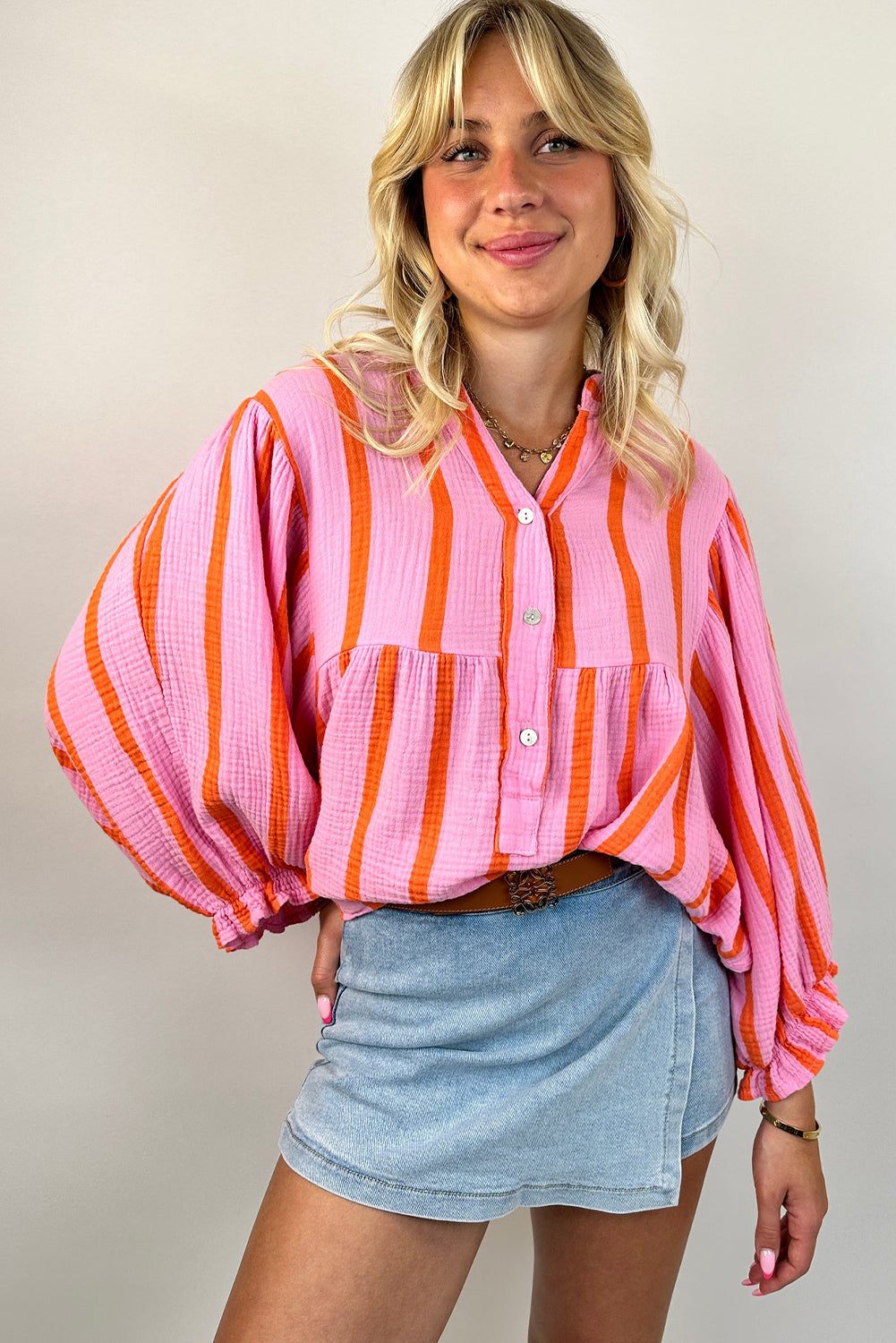 Orange Stripe Crinkle Ruffle Sleeve Loose TopMaterial:100%Cotton

• Effortlessly stylish, this loose top features vibrant stripes that add a pop of color to any outfit, perfect for casual outings or a day at t