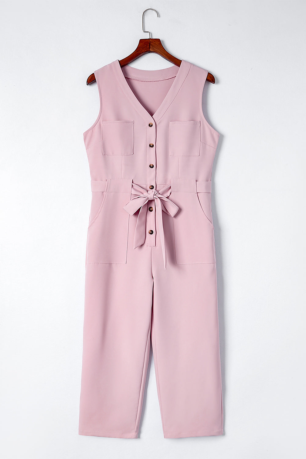 Pink Buttoned Sleeveless Cropped Jumpsuit With SashMaterial:95%POLYESTER+5%ELASTANE



		The
chic jumpsuit features a button-up front and a sleeveless design, making it
perfect for warm weather
	
	
		The
crop