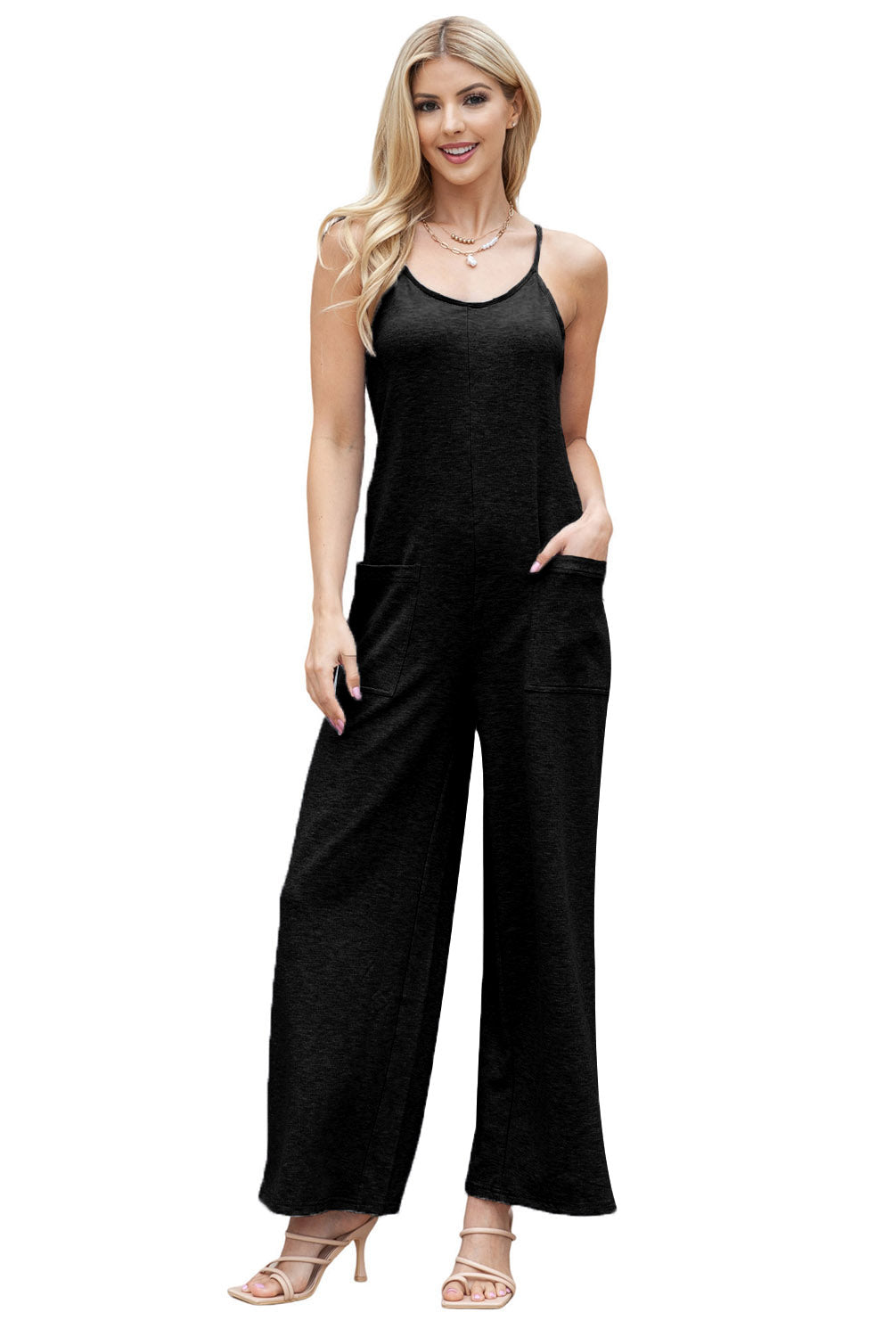 Gray Loose Fit Side Pockets Spaghetti Strap Wide Leg JumpsuitMaterial:65%Polyester+30%Cotton+5%Elastane



		Featuring a loose fit, the wide leg
jumpsuit provides freedom of movement
	
	
		Spaghetti straps highlight wome