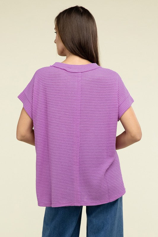 Brushed Waffle Exposed-Seam Short Sleeve TopElevate your casual wardrobe with this Brushed Waffle Top, featuring side slits, exposed seam details, and a stylish hi-low hem. Perfect for a relaxed yet trendy loo