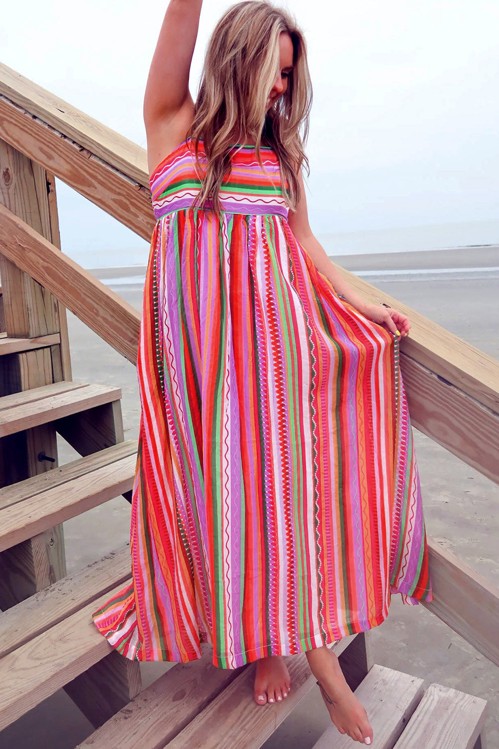 Multicolour Boho Striped Spaghetti Strap Smocked Back Maxi DressMaterial:100%Polyester

• Embrace a vibrant blend of colors in this maxi dress, perfect for daily wear with its relaxed, sleeveless design.
• The shirred back ensu